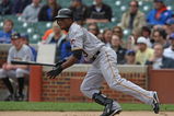 CHICAGO - MAY 27: Nyjer Morgan #3 of the Pittsburgh Pirates runs to first base after hitting the ball against the Chicago Cubs on May 27, 2009 at Wrigley Field in Chicago, Illinois. The Cubs defeated the Pirates 5-2. (Photo by Jonathan Daniel/Getty Images) 