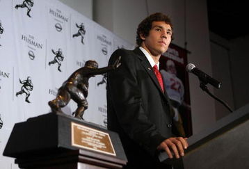 NEW YORK - DECEMBER 13:  Sam Bradford of the Oklahoma Sooners talks with the media at a press conference after winning the Heisman Trophy on December 13, 2008 at the Sports Museum of America in New York City.  (Photo by Nick Laham/Getty Images)