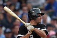 CHICAGO - JUNE 18: Scott Podsednik #22 of the Chicago White Sox bats against the Chicago Cubs during the game on June 18, 2009 at Wrigley Field in Chicago, Illinois. (Photo by Jonathan Daniel/Getty Images)