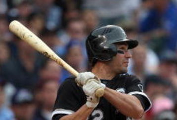 CHICAGO - JUNE 18:  Scott Podsednik #22 of the Chicago White Sox bats against the Chicago Cubs during the game on June 18, 2009 at Wrigley Field in Chicago, Illinois. (Photo by Jonathan Daniel/Getty Images)