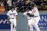 LOS ANGELES, CA - APRIL 30:  Matt Kemp #27 of the Los Angeles Dodgers celebrates a 8-5 win with Manny Ramirez #99 and Andre Ethier #16 over the San Diego Padres after the ninth inning at Dodger Stadium on April 30, 2009 in Los Angeles, California.  The Dodgers would win 8-5.  (Photo by Harry How/Getty Images)