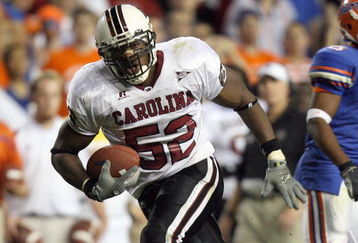 GAINESVILLE, FL - NOVEMBER 11:  Jasper Brinkley #52 of the South Carolina Gamecocks carries the ball during the game against the University of Florida Gators at Ben Hill Griffin Stadium November 11, 2006 in Gainesville, Florida. (Photo by Doug Benc/Getty Images)