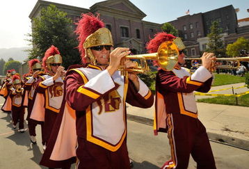 UNIVERSAL CITY, CA - JUNE 18:  The USC marching band performs at celebration of the re-opening of Courthouse Square at Universal Studios Hollywood on June 18, 2009 in Universal City, California. Courthouse Square has been fully restored following a four acre backlot fire in June 2008. The Square has been featured in movies such as 'Back to the Future,' 'Gremlins,' and 'Bye Bye Birdie.'  (Photo by Charley Gallay/Getty Images)