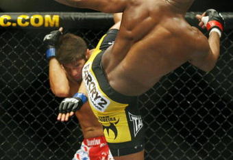CHICAGO- OCTOBER 25:  Anderson Silva fights Patrick Cote in the Middleweight Title Bout at UFC's Ultimate Fight Night at Allstate Arena on October 25, 2008 in Chicago, Illinois. (Photo by Tasos Katopodis/Getty Images)