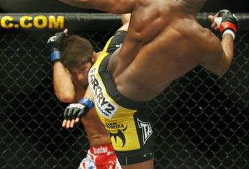 CHICAGO- OCTOBER 25:  Anderson Silva fights Patrick Cote in the Middleweight Title Bout at UFC's Ultimate Fight Night at Allstate Arena on October 25, 2008 in Chicago, Illinois. (Photo by Tasos Katopodis/Getty Images)