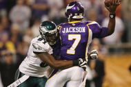 MINNEAPOLIS - JANUARY 04:   Tavaris Jackson #7 of the Minnesota Vikings is hit by Chris Clemons #91 of the Philadelphia Eagles during the NFC Wild Card playoff game on January 4, 2009 at the Hubert H. Humphrey Metrodome in Minneapolis, Minnesota. The Eagles defeated the Vikings 26-14.(Photo by Elsa/Getty Images)