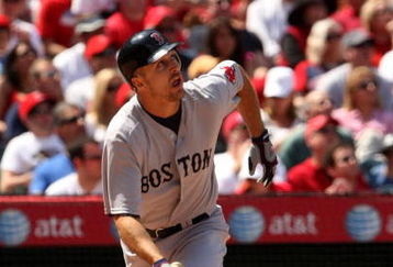 ANAHEIM, CA - APRIL 11:  Rocco Baldelli  #5 of the Boston Red Sox bats against the Los Angeles Angels of Anaheim on April 11, 2009 at Angel Stadium in Anaheim,  The Red Sox won 5-4.  (Photo by Stephen Dunn/Getty Images)