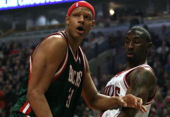 CHICAGO - MARCH 06:  Charlie Villanueva #31 of the Milwaukee Bucks reacts after he didn't get a call on an offensive play which he thought he was fouled on in the first quarter as Ben Gordon #7 of the Chicago Bulls looks on at the United Center on March 6, 2009 in Chicago, Illinois.  NOTE TO USER: User expressly acknowledges and agreees that, by downloading and/or using this Photograph, User is consenting to the terms and conditions of the Getty Images License Agreement.  (Photo by Jonathan Daniel/Getty Images)