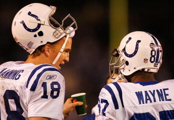 SAN DIEGO - JANUARY 03:  Wide receiver Reggie Wayne #87 of the Indianapolis Colts talks with quaterback Peyton Manning #18 during the AFC Wild Card Game against the San Diego Chargers on January 3, 2009 at Qualcomm Stadium in San Diego, California.  (Photo by Harry How/Getty Images)