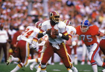 SAN DIEGO - JANUARY 31:  Quarterback Doug Williams #17 of the Washington Redskins looks to pass during Super Bowl XXII against the Denver Broncos at Jack Murphy Stadium on January 31, 1988 in San Diego, California.  The Redskins won 42-10.  (Photo by Rick Stewart/Getty Images)