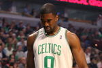 CHICAGO - MARCH 17: Leon Powe #0 of the Boston Celtics tests out an injured knee near the bench during a game against the Chicago Bulls on March 17, 2009 at the United Center in Chicago, Illinois. NOTE TO USER: User expressly acknowledges and agreees that, by downloading and/or using this Photograph, User is consenting to the terms and conditions of the Getty Images License Agreement. (Photo by Jonathan Daniel/Getty Images)