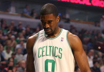 CHICAGO - MARCH 17: Leon Powe #0 of the Boston Celtics tests out an injured knee near the bench during a game against the Chicago Bulls on March 17, 2009 at the United Center in Chicago, Illinois. NOTE TO USER: User expressly acknowledges and agreees that, by downloading and/or using this Photograph, User is consenting to the terms and conditions of the Getty Images License Agreement. (Photo by Jonathan Daniel/Getty Images)