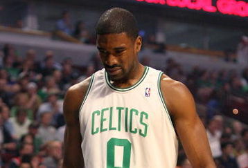 CHICAGO - MARCH 17: Leon Powe #0 of the Boston Celtics tests out an injured knee near the bench during a game against the Chicago Bulls on March 17, 2009 at the United Center in Chicago, Illinois. NOTE TO USER: User expressly acknowledges and agreees that, by downloading and/or using this Photograph, User is consenting to the terms and conditions of the Getty Images License Agreement. (Photo by Jonathan Daniel/Getty Images)