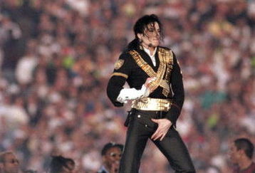 PASADENA, CA - JANUARY 31: Michael Jackson performs during the Halftime show as the Dallas Cowboys take on the Buffalo Bills in Super Bowl XXVII at Rose Bowl on January 31, 1993 in Pasadena, California. The Cowboys won 52-17. (Photo by George Rose/Getty Images)
