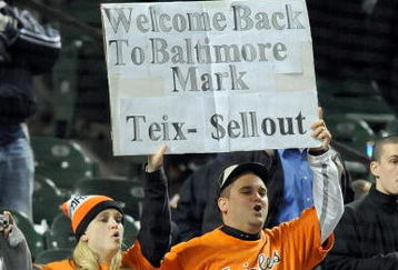 BALTIMORE - APRIL 8:  Fans hold up a sign during the game between the New York Yankees and the Baltimore Orioles at Camden Yards April 8, 2009 in Baltimore, Maryland.  (Photo by Greg Fiume/Getty Images)