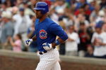 CHICAGO - JUNE 18:  Derrek Lee #25 of the Chicago Cubs rounds the bases after hitting a home run against the Chicago White Sox during the game on June 18, 2009 at Wrigley Field in Chicago, Illinois. (Photo by Jonathan Daniel/Getty Images)
