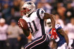 INDIANAPOLIS - NOVEMBER 02:  Randy Moss #81 of the New England Patriots runs for yards after the catch on the last play of the game against the Indianapolis Colts at Lucas Oil Stadium on November 2, 2008 in Indianapolis, Indiana. The Colts won 18-15. (Photo by Andy Lyons/Getty Images)