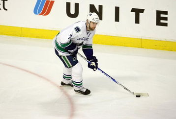 CHICAGO - MAY 05:  Mattias Ohlund #2 of the Vancouver Canucks skates with the puck against the Chicago Blackhawks during Game Three of the Western Conference Semifinal Round of the 2009 Stanley Cup Playoffs on May 5, 2009 at the United Center in Chicago, Illinois  (Photo by Jonathan Daniel/Getty Images)
