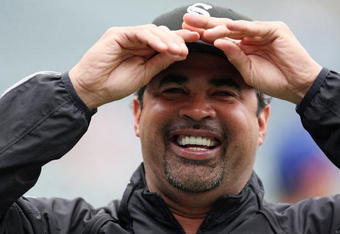CHICAGO - JUNE 17: Manager Ozzie Guillen #13 of the Chicago White Sox jokes during batting practice before an interleague game against the Chicago Cubs on June 17, 2009 at Wrigley Field in Chicago, Illinois. (Photo by Jonathan Daniel/Getty Images)