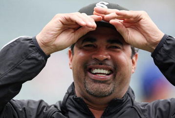 CHICAGO - JUNE 17: Manager Ozzie Guillen #13 of the Chicago White Sox jokes during batting practice before an interleague game against the Chicago Cubs on June 17, 2009 at Wrigley Field in Chicago, Illinois. (Photo by Jonathan Daniel/Getty Images)