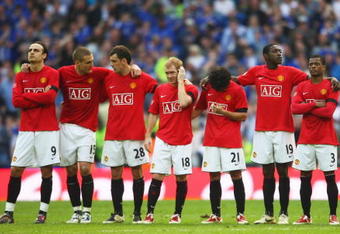 LONDON, ENGLAND - APRIL 19:  Manchester United players look despondent in the penalty shoot out during the FA Cup sponsored by E.ON Semi Final match between Everton and Manchester United at Wembley Stadium on April 19, 2009 in London, England.  (Photo by Jamie McDonald/Getty Images)