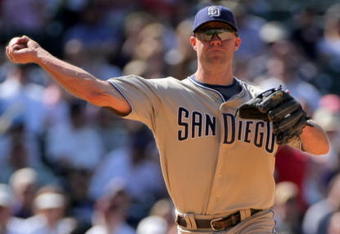 DENVER - APRIL 29:  Third baseman Kevin Kouzmanoff #5 of the San Diego Padres throws out a runner against the Colorado Rockies during MLB action at Coors Field on April 29, 2009 in Denver, Colorado. The Rockies defeated the Padres 7-5.  (Photo by Doug Pensinger/Getty Images)