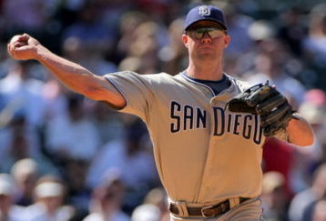 DENVER - APRIL 29:  Third baseman Kevin Kouzmanoff #5 of the San Diego Padres throws out a runner against the Colorado Rockies during MLB action at Coors Field on April 29, 2009 in Denver, Colorado. The Rockies defeated the Padres 7-5.  (Photo by Doug Pensinger/Getty Images)