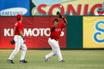ARLINGTON, TX - JULY 1:  Center fielder Marlon Byrd #22 of the Texas Rangers makes the fly out against Juan Rivera #20 of the Los Angeles Angels of Anaheim (not pictured) at Rangers Ballpark July 1, 2009 in Arlington, Texas.  (Photo by Ronald Martinez/Getty Images)