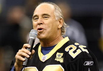 NEW ORLEANS - DECEMBER 03:  Jimmy Buffett sings the national anthem before the start of the game between the New Orleans Saints and San Francisco 49ers December 3, 2006 at the Superdome in New Orleans, Louisiana.  (Photo by Chris Graythen/Getty Images)