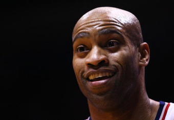 EAST RUTHERFORD, NJ - MARCH 27:  Vince Carter #15 of the New Jersey Nets reacts against the Los Angeles Lakers during the game on March 27, 2009 at the Izod Center in East Rutherford, New Jersey. NOTE TO USER: User expressly acknowledges and agrees that, by downloading and/or using this Photograph, User is consenting to the terms and conditions of the Getty Images License Agreement.  (Photo by Chris McGrath/Getty Images)