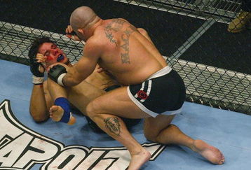 LONDON - JULY 13:  Ian Freeman of Great Britain fights with Frank Mir of the USA during the Ultimate Fighting Championship, 'Brawl in the Royal Albert Hall', in the Royal Albert Hall London, England on July 13, 2002. (Photo by Mike Hewitt/Getty Images)