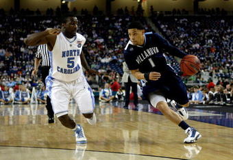 DETROIT - APRIL 04:  Scottie Reynolds #1 of the Villanova Wildcats drives in the second half against Ty Lawson #5 of the North Carolina Tar Heels during the National Semifinal game of the NCAA Division I Men's Basketball Championship at Ford Field on April 4, 2009 in Detroit, Michigan.  (Photo by Andy Lyons/Getty Images)