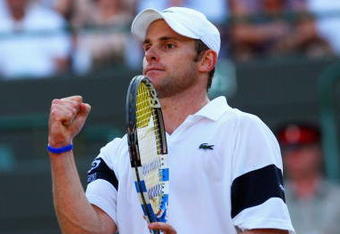 WIMBLEDON, ENGLAND - JULY 01:  Andy Roddick of USA celebrates victory during the men's singles quarter final match against Lleyton Hewitt of Australia on Day Nine of the Wimbledon Lawn Tennis Championships at the All England Lawn Tennis and Croquet Club on July 1, 2009 in London, England.  (Photo by Hamish Blair/Getty Images)