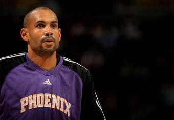 DENVER - MARCH 05:  Grant Hill 33 of the Phoenix Suns warms up prior to facing the Denver Nuggets during NBA action at the Pepsi Center on March 5, 2008 in Denver, Colorado. The Nuggets defeated the Suns 126-113. NOTE TO USER: User expressly acknowledges and agrees that, by downloading and or using this photograph, user is consenting to the term and conditions of the Getty Images License Agreement.  (Photo by Doug Pensinger/Getty Images)
