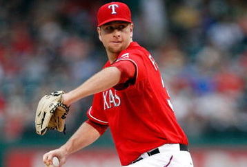 ARLINGTON, TX - JUNE 30:  Pitcher Scott Feldman #39 of the Texas Rangers throws against the Los Angeles Angels of Anaheim on June 30, 2009 at Rangers Ballpark in Arlington, Texas.  (Photo by Ronald Martinez/Getty Images)