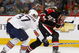OTTAWA - MARCH 5:  Dennis Grebeshkov #37 of the Edmonton Oilers tries to deflect a shot by Dany Heatley #15 of the Ottawa Senators during a game on March 5, 2009 at the Scotiabank Place in Ottawa, Canada. (Photo by Phillip MacCallum/Getty Images)