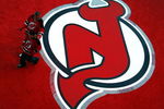 NEWARK, NJ - OCTOBER 27:  The first fans through the door walk across a logo on the atrium floor before a game between the Ottawa Senators and the New Jersey Devils at the newly opened Prudential Center October 27, 2007 in Newark, New Jersey. (Photo by Jeff Zelevansky/Getty Images)