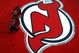 NEWARK, NJ - OCTOBER 27:  The first fans through the door walk across a logo on the atrium floor before a game between the Ottawa Senators and the New Jersey Devils at the newly opened Prudential Center October 27, 2007 in Newark, New Jersey. (Photo by Jeff Zelevansky/Getty Images)