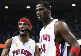 AUBURN HILLS, MI - JUNE 16:  Richard Hamilton #32 of the Detroit Pistons celebrates with teammate Antonio McDyess #24 after McDyess was fouled on a play in the second quarter against the San Antonio Spurs in Game four of the 2005 NBA Finals at The Palace of Auburn Hills on June 16, 2005 in Auburn Hills, Michigan. NOTE TO USER: User expressly acknowledges and agrees that, by downloading and or using this photograph, User is consenting to the terms and conditions of the Getty Images License Agreement.  (Photo by Brian Bahr/Getty Images)