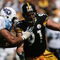PITTSBURGH - SEPTEMBER 11:  Defensive end Aaron Smith #91 of the Pittsburgh Steelers tries to get around tackle Jacob Bell #60 of the Tennessee Titans during a game at Heinz Field on September 11, 2005 in Pittsburgh, Pennsylvania.  The Steelers defeated the Titans 34-7. (Photo by Jonathan Daniel/Getty Images)
