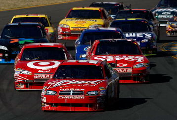 SONOMA, CA - JUNE 21:  Kasey Kahne, driver of the #9 Budweiser Dodge, leads the field during the NASCAR Sprint Cup Series Toyota/Save Mart 350 at the Infineon Raceway on June 21, 2009 in Sonoma, California.  (Photo by Jonathan Ferrey/Getty Images)