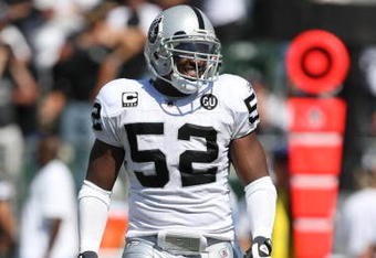 OAKLAND, CA - SEPTEMBER 28:  Kirk Morrison #52 of the Oakland Raiders looks on during the game against the San Diego Chargers on September 28, 2008 at Oakland Coliseum in Oakland, California. (Photo by Jed Jacobsohn/Getty Images)