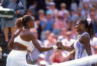 6 Jul 2000:  Venus Williams of the USA (left) beats younger sister Serena during the semi final game at the Wimbledon Lawn Tennis Championship at the All England Lawn Tennis and Croquet Club, Wimbledon, London. \ Mandatory Credit: Clive Brunskill /Allsport