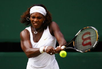 WIMBLEDON, ENGLAND - JULY 02:  Serena Williams of USA plays a backhand during the women's singles semi final match against Elena Dementieva of Russia on Day Ten of the Wimbledon Lawn Tennis Championships at the All England Lawn Tennis and Croquet Club on July 2, 2009 in London, England.  (Photo by Julian Finney/Getty Images)
