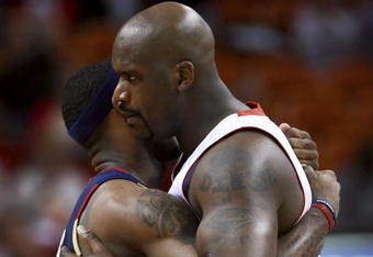 MIAMI - FEBRUARY 01:  Shaquille O'Neal #32 of the Miami Heat greets LeBron James #23 of the Cleveland Cavaliers before the game at American Airlines Arena February 1, 2007 in Miami, Florida. NOTE TO USER: User expressly acknowledges and agrees that, by downloading and or using this photograph, User is consenting to the terms and conditions of the Getty Images License Agreement.  (Photo by Doug Benc/Getty Images)