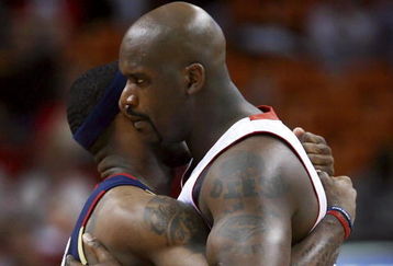 MIAMI - FEBRUARY 01:  Shaquille O'Neal #32 of the Miami Heat greets LeBron James #23 of the Cleveland Cavaliers before the game at American Airlines Arena February 1, 2007 in Miami, Florida. NOTE TO USER: User expressly acknowledges and agrees that, by downloading and or using this photograph, User is consenting to the terms and conditions of the Getty Images License Agreement.  (Photo by Doug Benc/Getty Images)