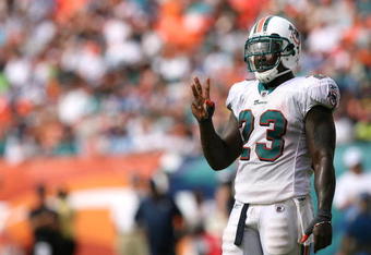 MIAMI - OCTOBER 05:  Running back Ronnie Brown #23 of the Miami Dolphins gestures to the sidelines while taking on the San Diego Chargers at Dolphin Stadium on October 5, 2008 in Miami, Florida. The Dolphins defeated the Chargers 17-10.  (Photo by Doug Benc/Getty Images)