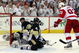 PITTSBURGH - JUNE 09: Johan Franzen #93 of the Detroit Red Wings has his shot blocked by Rob Scuderi #4 of the Pittsburgh Penguins late in Game Six of the NHL Stanley Cup Finals at the Mellon Arena on June 9, 2009 in Pittsburgh, Pennsylvania. (Photo by Jim McIsaac/Getty Images)