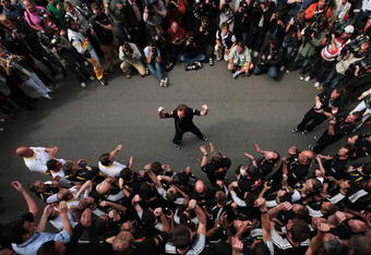 NORTHAMPTON, UNITED KINGDOM - JUNE 21:  Red Bull Racing Team Principal Christian Horner (C) celebrates with team mates after Sebastian Vettel of Germanys victory during the British Formula One Grand Prix at Silverstone on June 21, 2009 in Northampton, England.  (Photo by Mark Thompson/Getty Images)