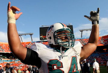 MIAMI - NOVEMBER 09:  Offensive lineman Samson Satele #64 of the Miami Dolphins celebrates his team's victory over the Seattle Seahawks at Dolphin Stadium on November 9, 2008 in Miami, Florida. The Dolphins defeated the Seahawks 21-19.  (Photo by Doug Benc/Getty Images)